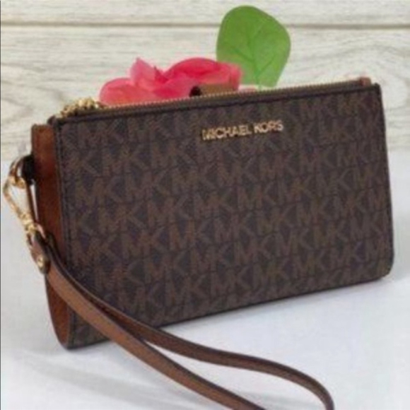 Michael Kors DoubleZip
Wallet Wristlet - Picture 1 of 7